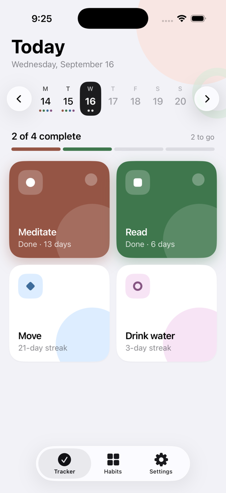 The Today screen on an iPhone: two of four habits done, a week strip above, a progress bar below